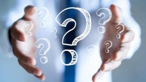 Question Marks Cupped In Two Hands