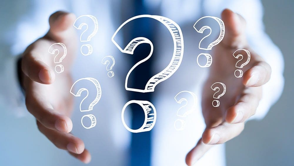 Question Marks Cupped In Two Hands