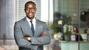 Man in office looking at camera