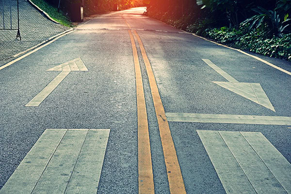 Two way street with directional arrows pointing in both directions